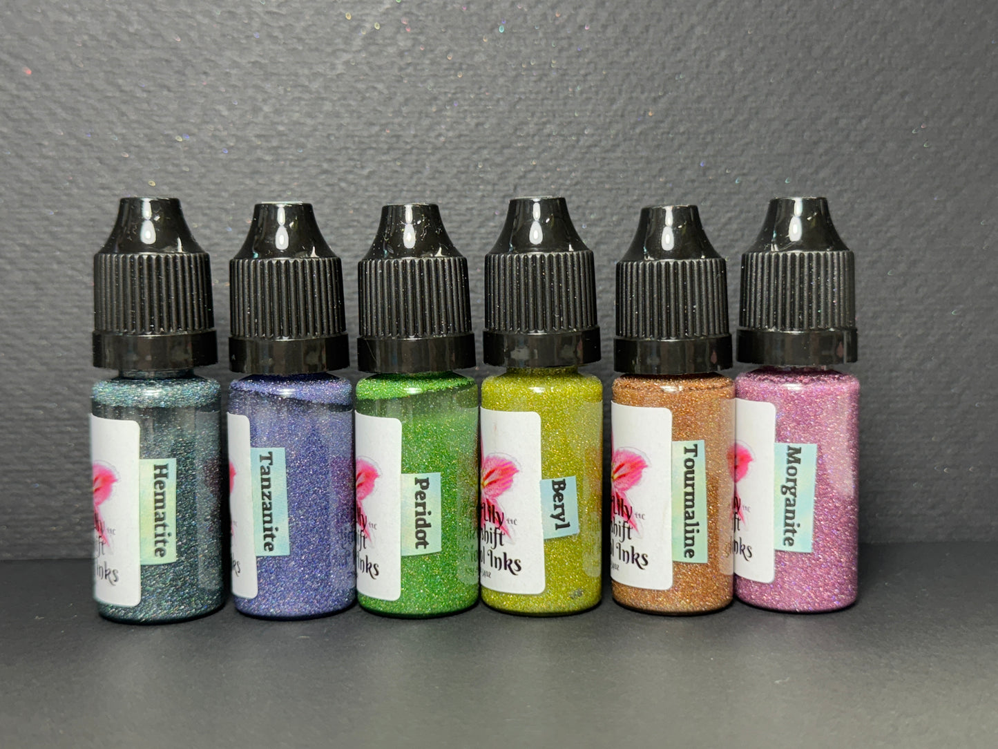 GEMS Inks is a series of Vivid Intense Laser Holographic Inks for Epoxy Resin Arts Crafts, alcohol ink art