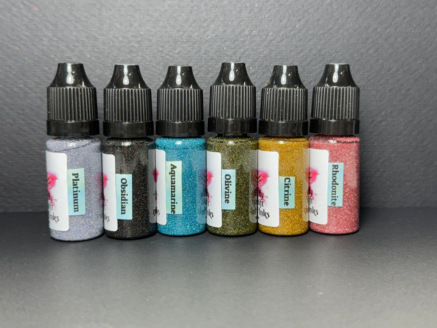 GEMS Inks is a series of Vivid Intense Laser Holographic Inks for Epoxy Resin Arts Crafts, alcohol ink art