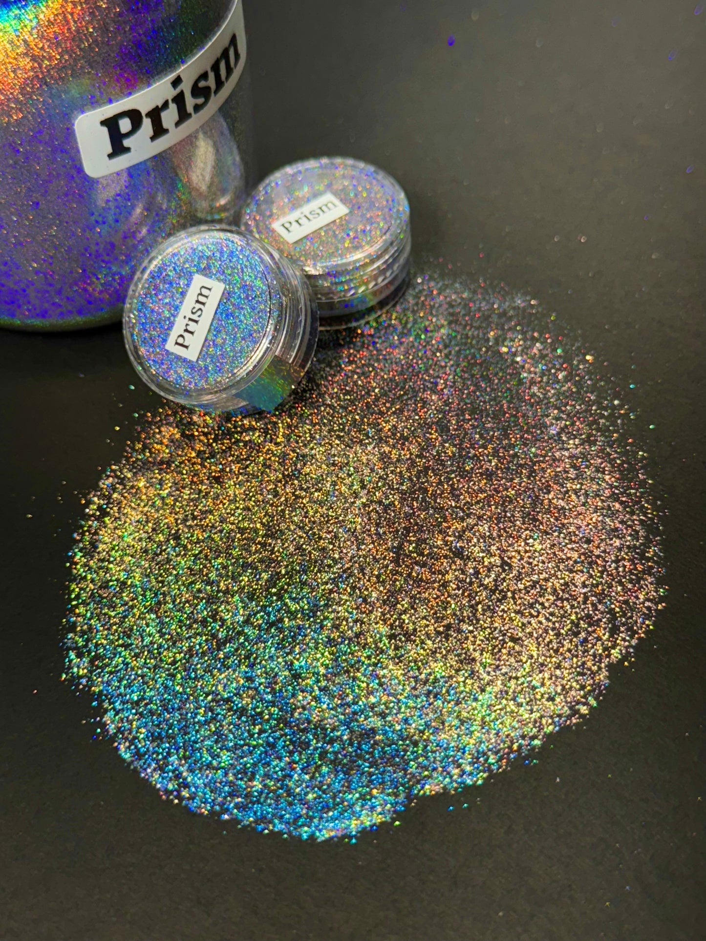 Prism PIGMENT is a Kaleidoscopic Explosion of Extreme Holographic ultramicro-flake powder with an Intense Metallic Shimmer and Sparkle